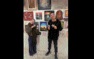 Pixelated male and female artist by their work at the art of isolation