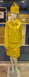 Yellow Spiky Raincoat by Katie Page